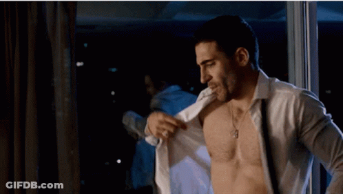 Shirtless Man With Necklace And Ring GIF