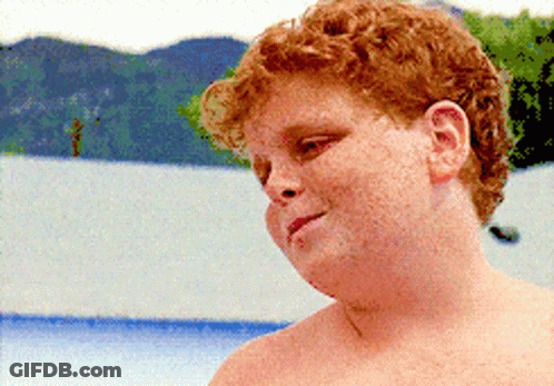 Shirtless Man With Red Hair And Freckles Looking Left GIF