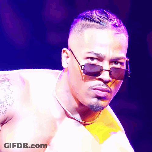 Shirtless Man With Sunglasses And Arm Tattoo GIF