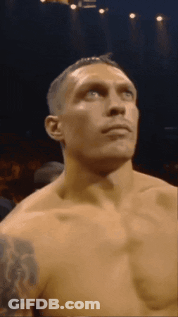 Shirtless Man With Tattoo Looking Up GIF