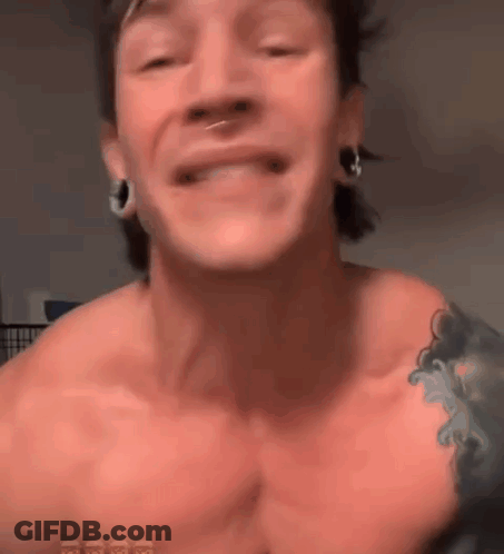 Shirtless Man With Tattoo Smiling Talking GIF