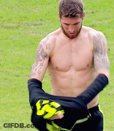 Shirtless Man With Tattoo Taking Off Number 55 Shirt GIF