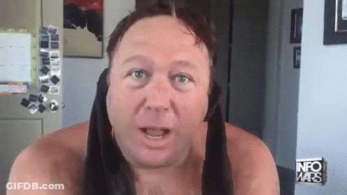 Shirtless Man With Towel And Info Wars Sign GIF
