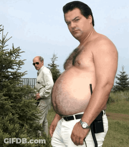 Shirtless Man With Walkie Talkie GIF