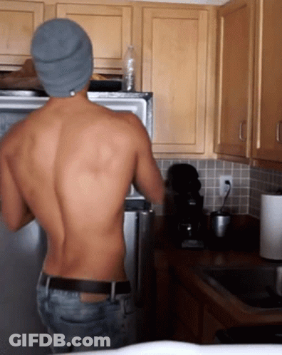 Shirtless Man With Water Bottle In Refrigerator GIF