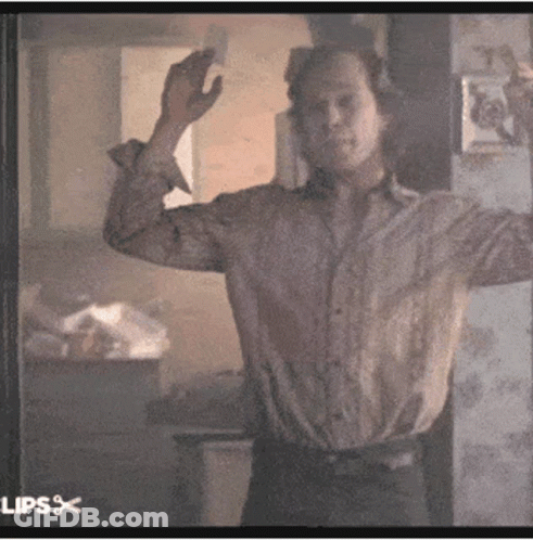 Shirtless Man With White Face Mask Talking GIF