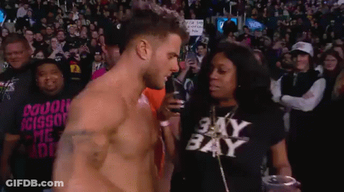 Shirtless Man With Woman In Sky Bay Shirt GIF