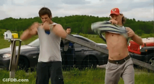 Shirtless Men In Field GIF