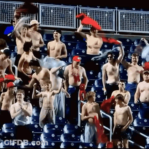 Shirtless Men Watching Game In Stadium GIF