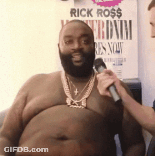 Shirtless Rick Ross Being Interviewed GIF