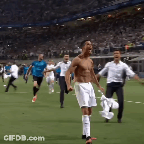 Shirtless Soccer Player Celebrating With Teammates GIF
