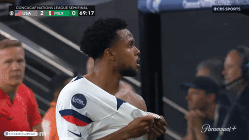 Shirtless Soccer Player In Front Of CBS Sports Ad GIF