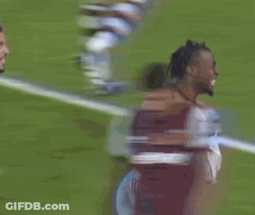 Shirtless Soccer Player Running Towards Goal GIF