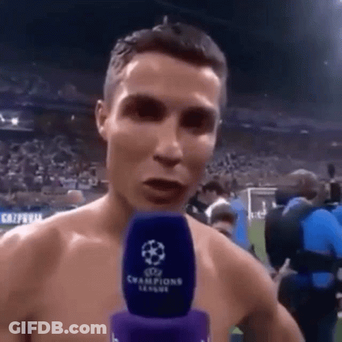 Shirtless Soccer Player Speaking Into Microphone GIF