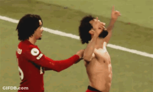 Shirtless Soccer Player Standing Next To Another GIF