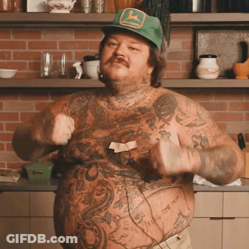 Shirtless Tattooed Man In Green John Deere Hat Thumbs Up GIF