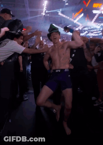 Shirtless UFC Fighter In Purple Shorts Dancing GIF
