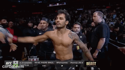 Shirtless UFC Fighter Walking Through Crowd GIF
