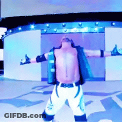 Shirtless Wrestler Arms Out GIF