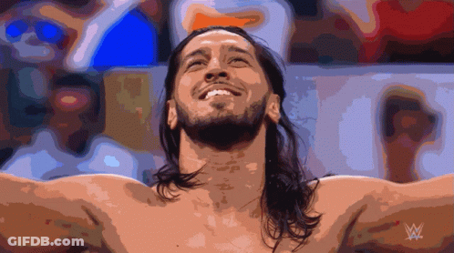 Shirtless Wrestler Arms Outstretched With WWE Logo GIF