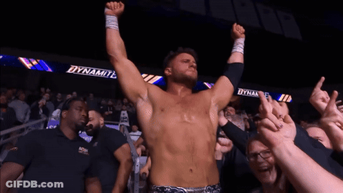 Shirtless Wrestler Before Crowd With Dynamite GIF