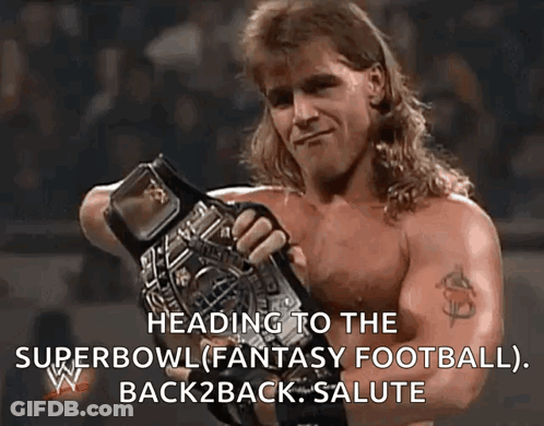 Shirtless Wrestler Holding Championship Belt GIF