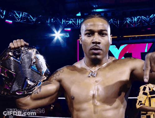 Shirtless Wrestler Holding Championship Belt GIF