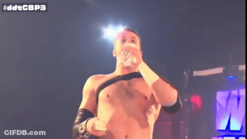 Shirtless Wrestler Holding Microphone GIF