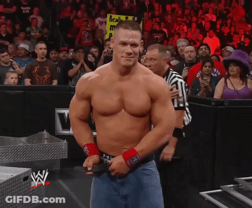 Shirtless Wrestler Holding Scala Sign GIF