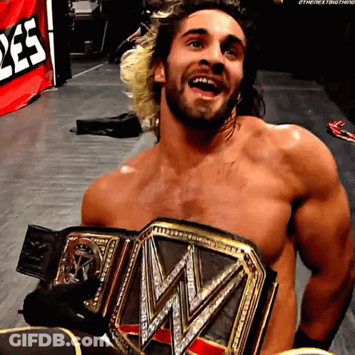 Shirtless Wrestler Holding WWE Title Belt GIF