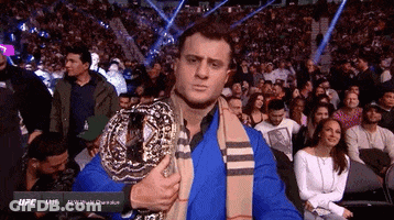Shirtless Wrestler In Blue And White Star-Spangled Trunk GIF