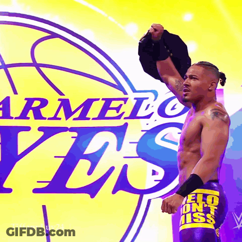 Shirtless Wrestler In Front Of Armelo Yes Sign GIF