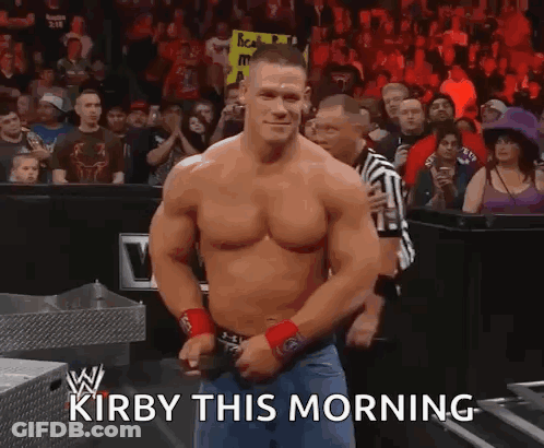 Shirtless Wrestler In Front Of Crowd Saying Kirby This Morning GIF