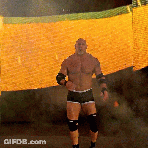 Shirtless Wrestler In Front Of WWE Screen GIF
