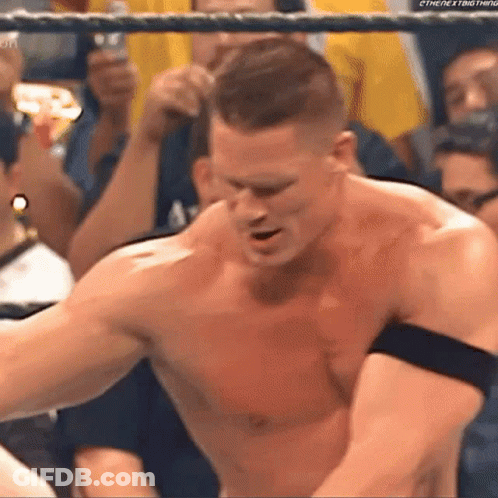 Shirtless Wrestler In Ring With Crowd GIF