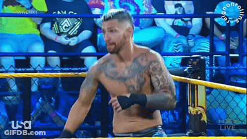 Shirtless Wrestler In Ring With USA Logo GIF