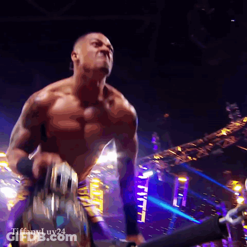 Shirtless Wrestler In Sunglasses Walking Down Purple Ramp GIF