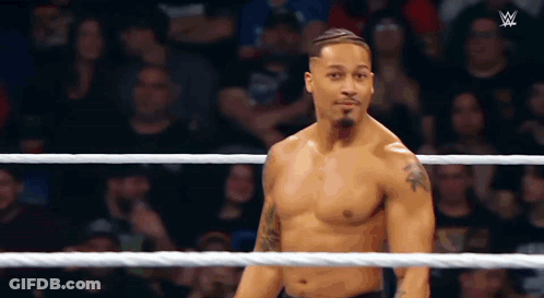 Shirtless Wrestler In Wrestling Ring Crowd Watching GIF