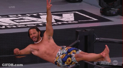 Shirtless Wrestler Lying On Back In Ring GIF