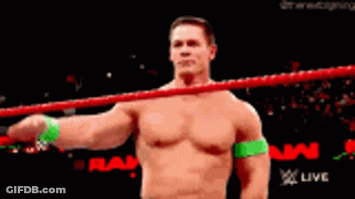 Shirtless Wrestler Saluting In Ring GIF
