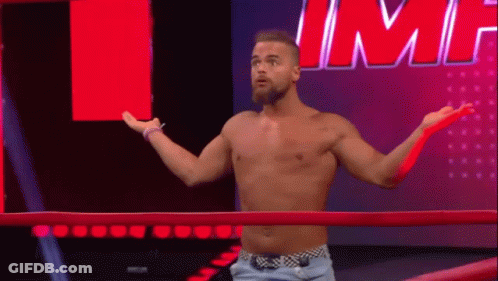 Shirtless Wrestler Standing In Ring GIF