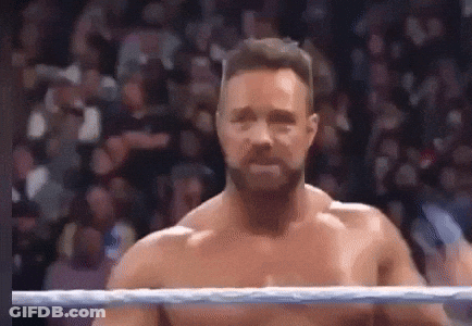 Shirtless Wrestler Standing In Ring GIF