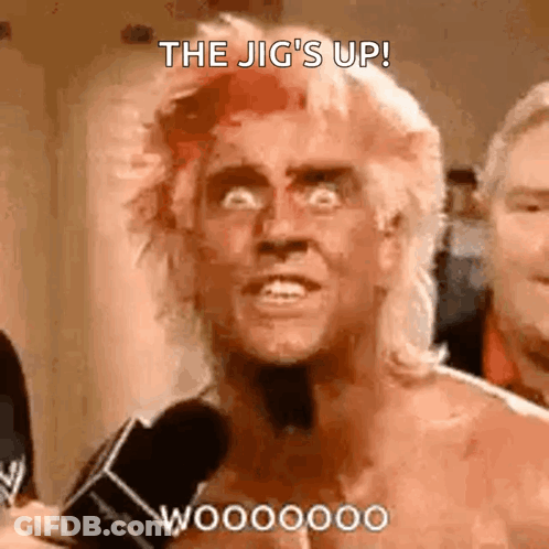 Shirtless Wrestler Talking Into Microphone GIF
