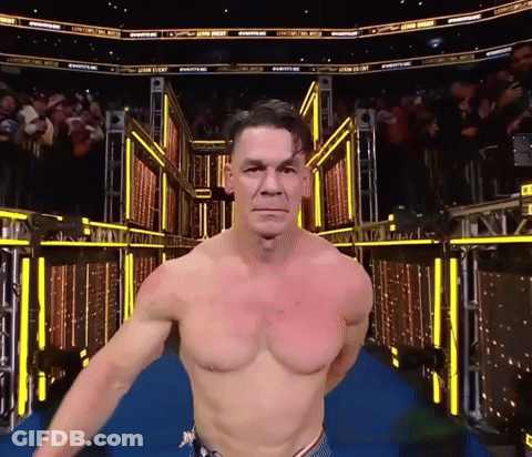 Shirtless Wrestler Walking Blue Carpet Crowd Wrestling Sign GIF