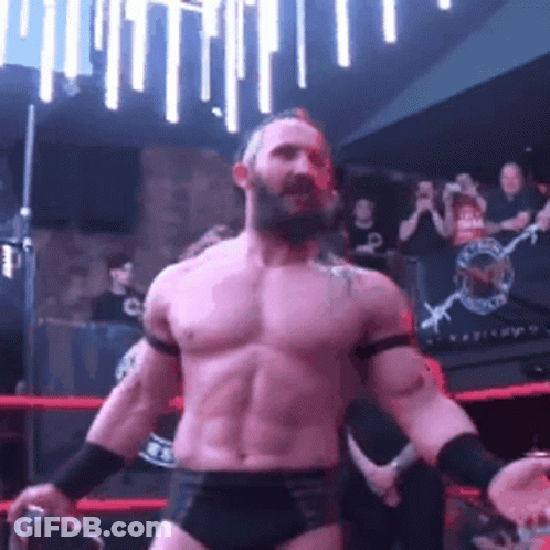 Shirtless Wrestler With Beard In Ring GIF