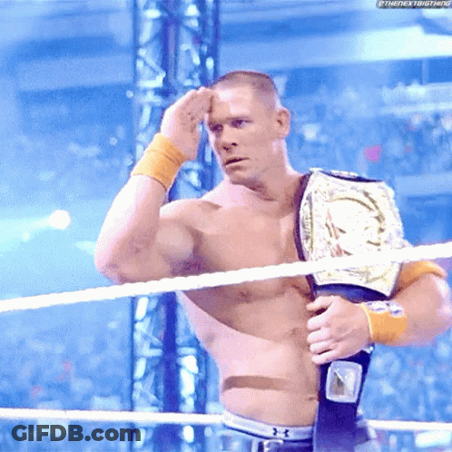 Shirtless Wrestler With Championship Belt In Ring GIF