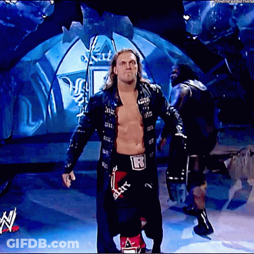 Shirtless Wrestler With Letter R On Belt On Stage GIF