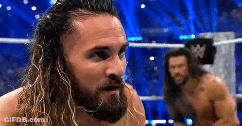Shirtless Wrestler With Long Hair And Beard In Ring GIF
