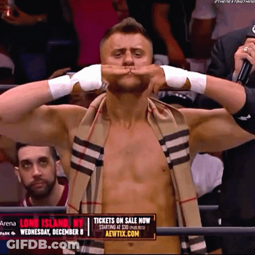Shirtless Wrestler With Scarf And Tickets On Sale Now Sign GIF