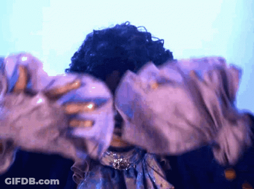 Shirtless Wrestler With Sunglasses And Necklace In Ring GIF